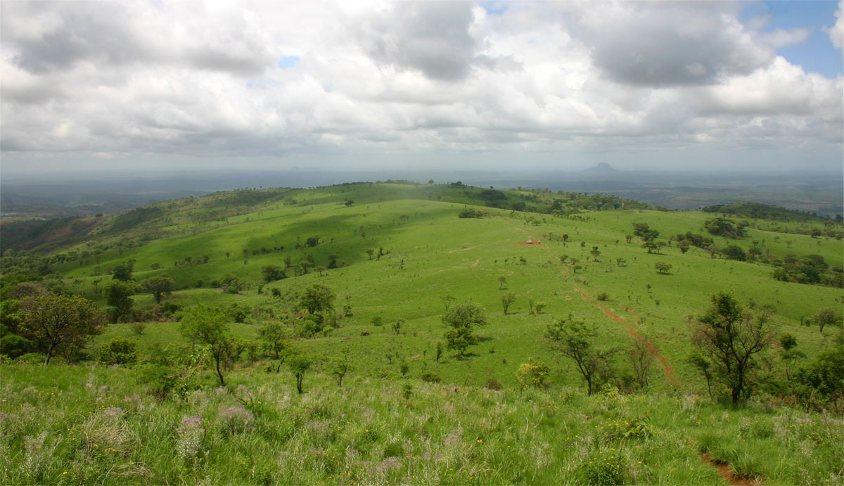 View over the grassland plateau from the slopes above the Falls